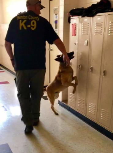 Andy and Billy searching lockers